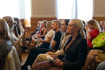 Participants listening in the rows