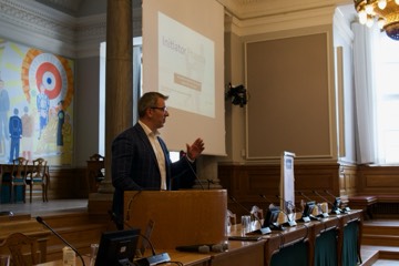 A speaker at the lectern