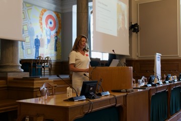 A speaker at the lectern