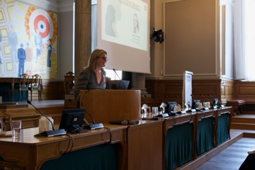 A speaker at the lectern
