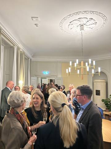 Guests talking after the launch